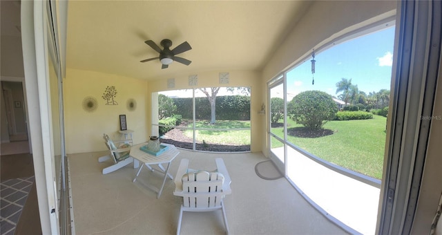 sunroom / solarium with ceiling fan