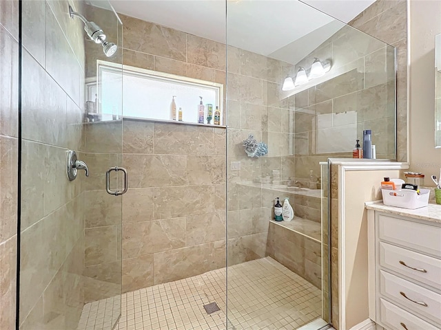 bathroom with vanity and an enclosed shower