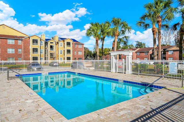 view of pool with a pergola