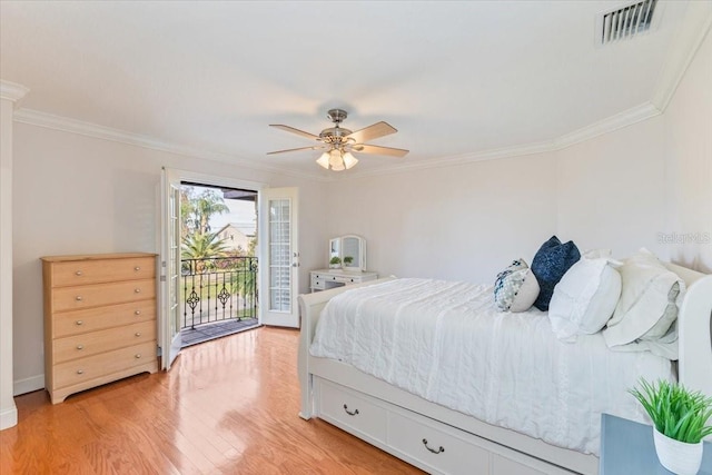 bedroom with crown molding, access to outside, ceiling fan, and light wood-type flooring