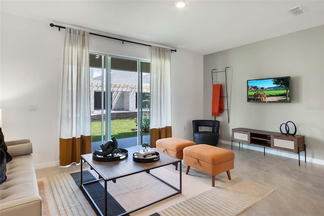 living room featuring light tile patterned flooring