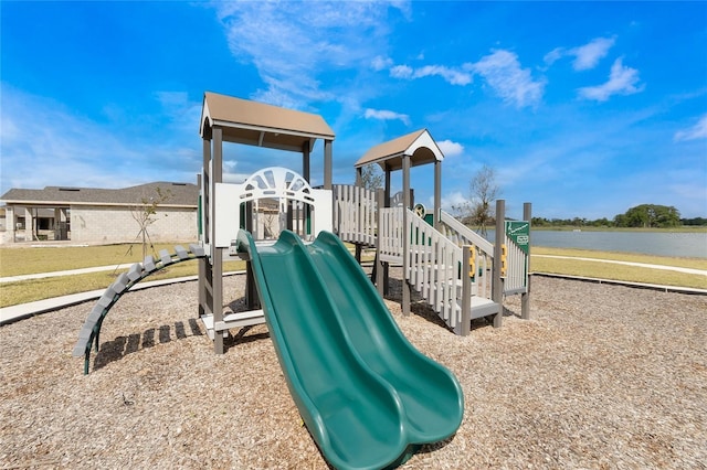 view of jungle gym with a water view