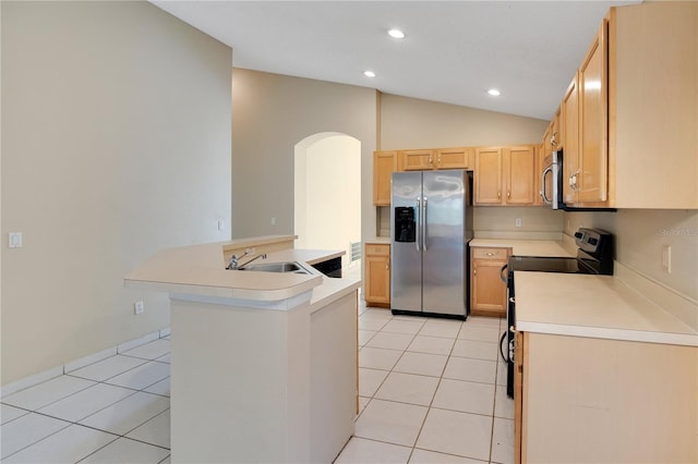 kitchen featuring sink, stainless steel appliances, a center island with sink, light tile patterned flooring, and light brown cabinets