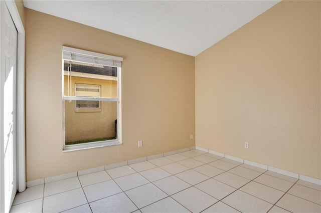 view of tiled spare room