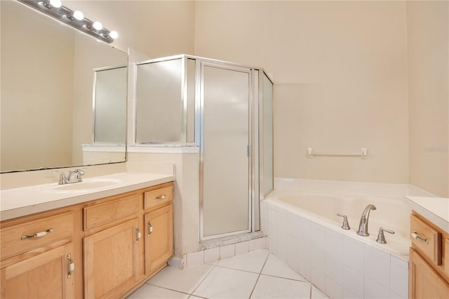 bathroom with vanity, tile patterned floors, and plus walk in shower