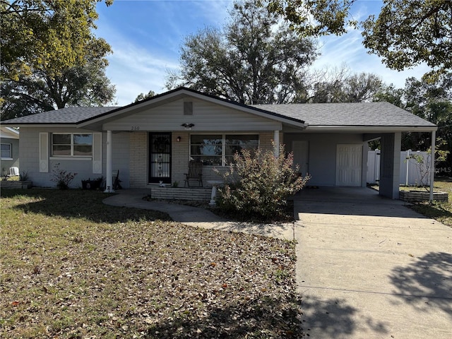 single story home with a carport and a front yard