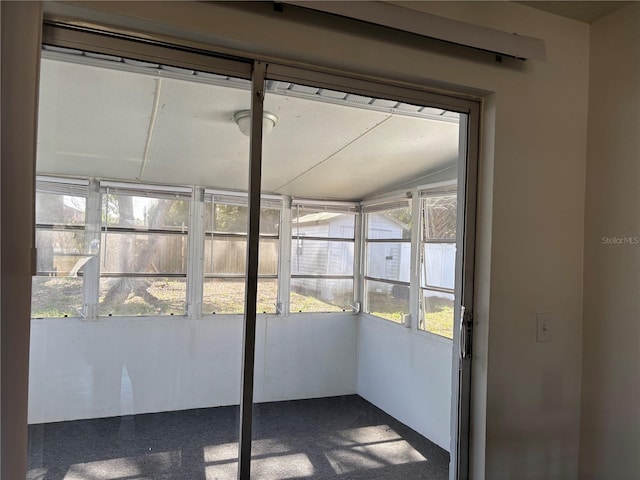 unfurnished sunroom featuring a healthy amount of sunlight