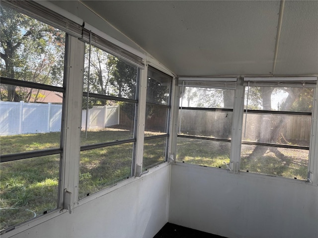 unfurnished sunroom with a wealth of natural light