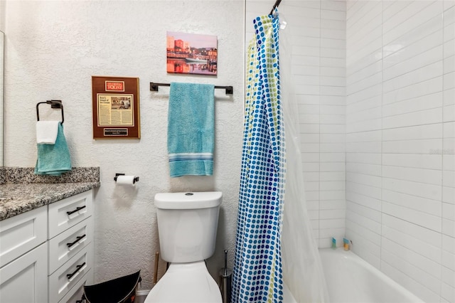 full bathroom featuring vanity, toilet, and shower / bath combo