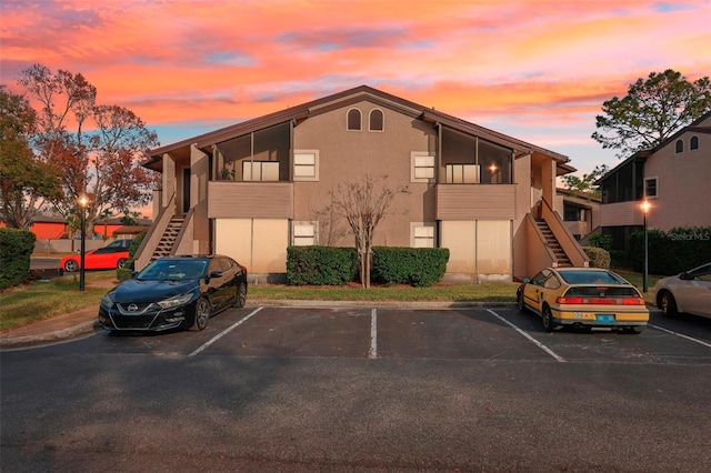 view of outdoor building at dusk