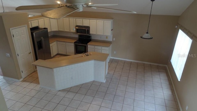 kitchen featuring appliances with stainless steel finishes, decorative light fixtures, white cabinetry, light tile patterned floors, and ceiling fan