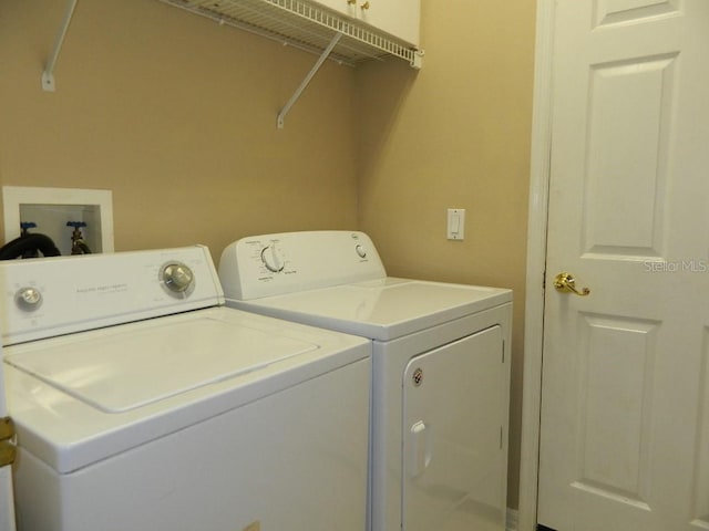 laundry area featuring washing machine and dryer