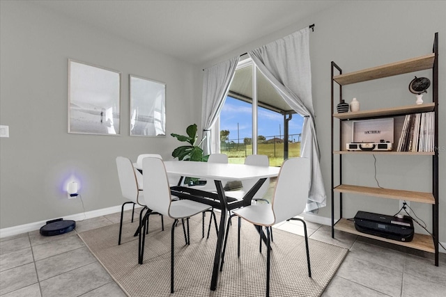 dining room with tile patterned floors