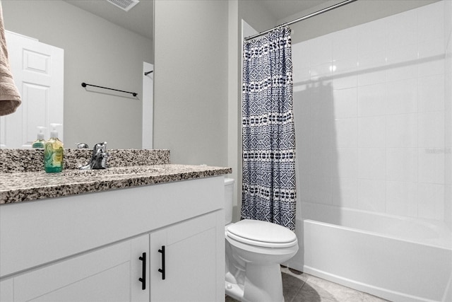 full bathroom with vanity, shower / tub combo with curtain, tile patterned floors, and toilet