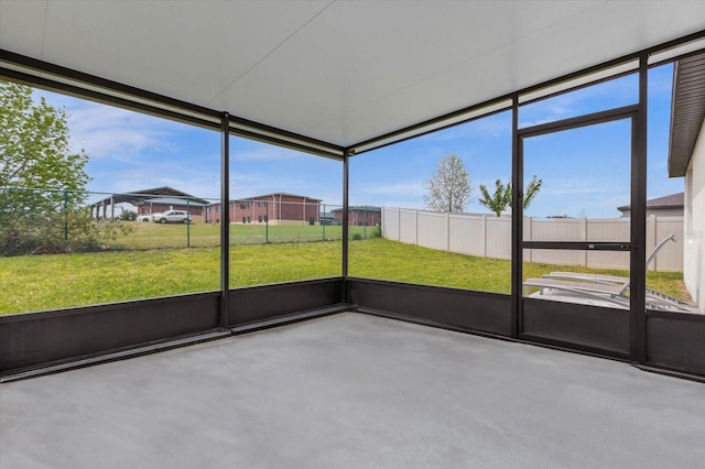 unfurnished sunroom with a wealth of natural light