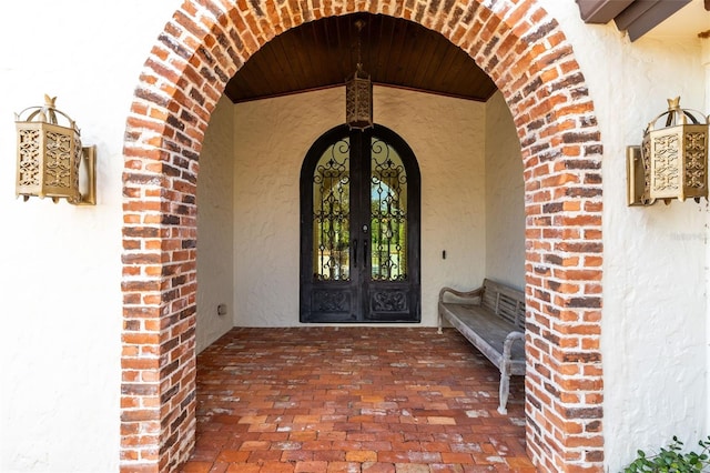 entrance to property featuring french doors