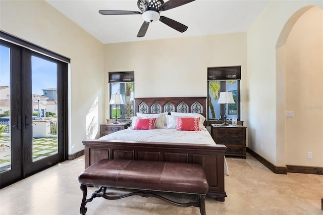 bedroom with french doors, ceiling fan, multiple windows, and access to outside