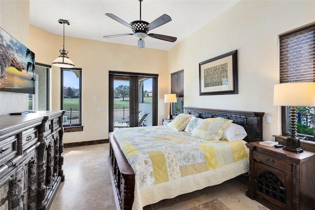 bedroom featuring access to exterior and french doors