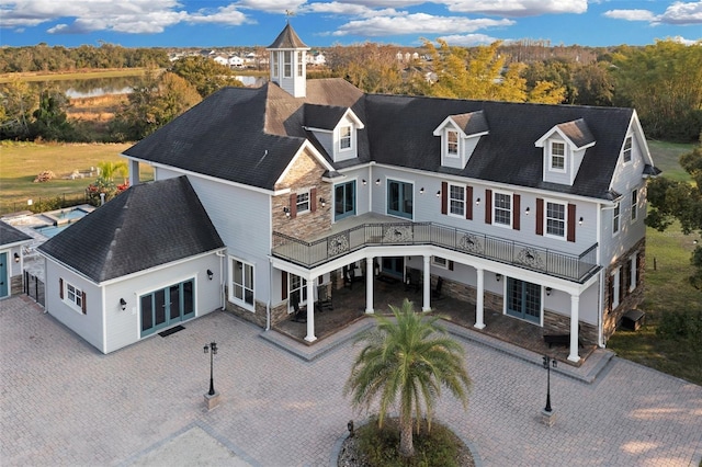 exterior space with a water view