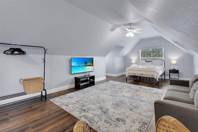 bedroom featuring ceiling fan, vaulted ceiling, dark hardwood / wood-style floors, and a textured ceiling