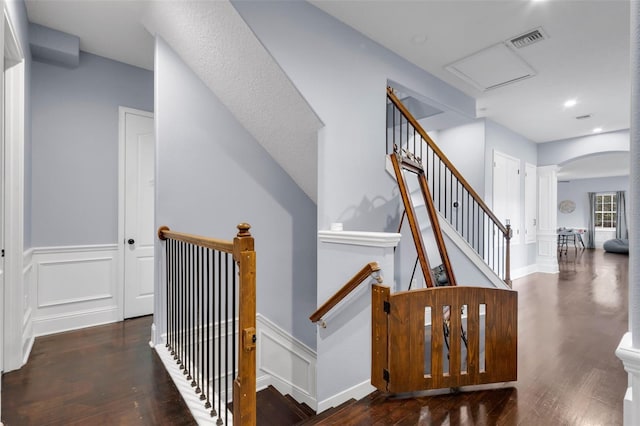 stairway with wood-type flooring