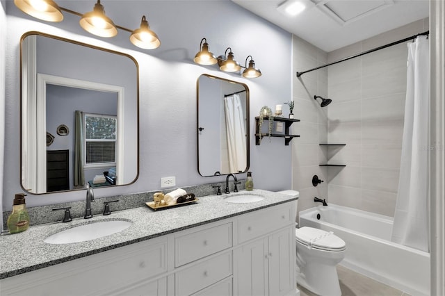 full bathroom with vanity, toilet, and shower / bath combo with shower curtain