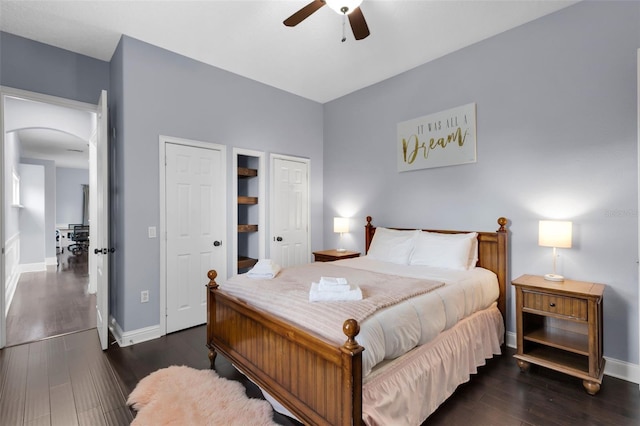 bedroom featuring ceiling fan and dark hardwood / wood-style flooring