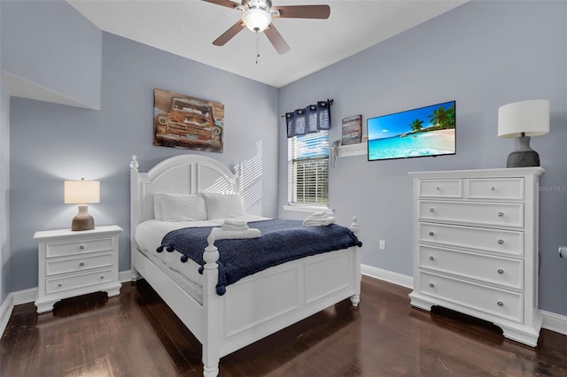 bedroom with dark wood-type flooring and ceiling fan