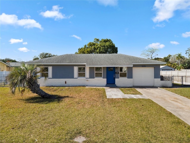 ranch-style home with a garage and a front yard