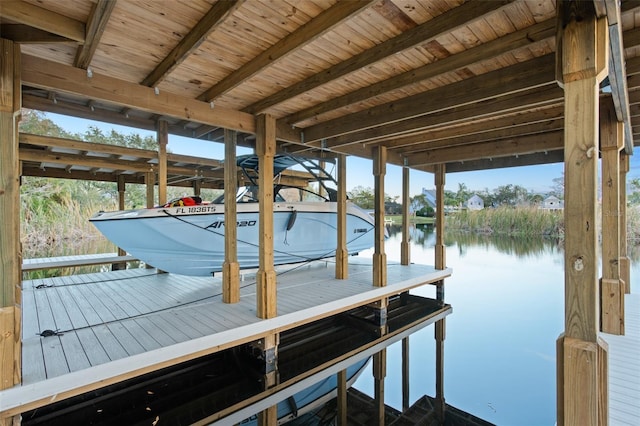 dock area featuring a water view