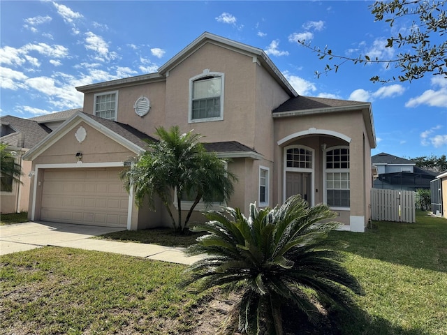 front of property with a garage and a front lawn