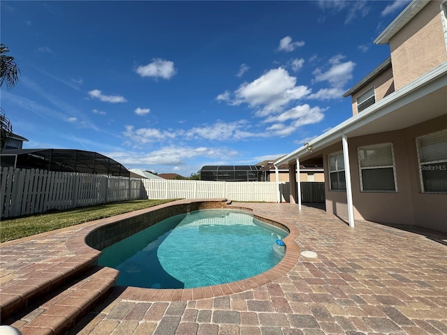 view of pool featuring a patio area