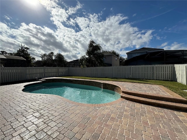 view of pool featuring a patio area