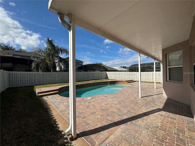 view of pool featuring a patio