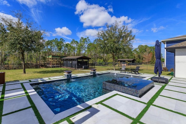 view of pool with pool water feature, a yard, a hot tub, a gazebo, and a patio area