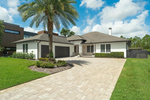 10416 Pocket Ln, Orlando, FL 32836 - view of front of home featuring stucco siding, an attached garage, and driveway