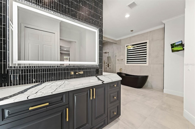 10416 Pocket Ln, Orlando, FL 32836 - bathroom featuring tile walls, crown molding, a soaking tub, vanity, and backsplash