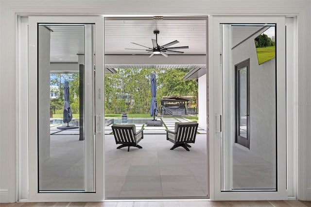 10416 Pocket Ln, Orlando, FL 32836 - doorway to outside with a ceiling fan