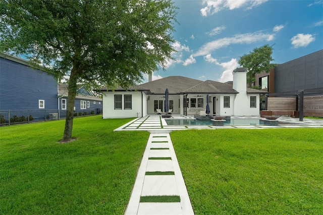 10416 Pocket Ln, Orlando, FL 32836 - back of house featuring a pool, a patio, a fenced backyard, and a hot tub