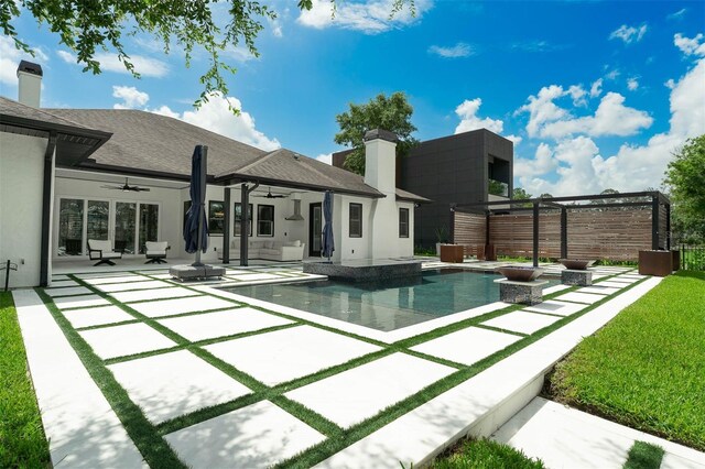 10416 Pocket Ln, Orlando, FL 32836 - view of swimming pool with ceiling fan, a patio, and a jacuzzi