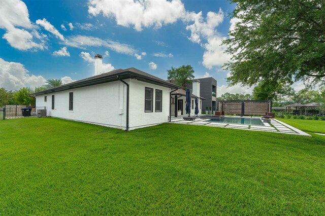 10416 Pocket Ln, Orlando, FL 32836 - rear view of property featuring stucco siding, a fenced backyard, and a patio