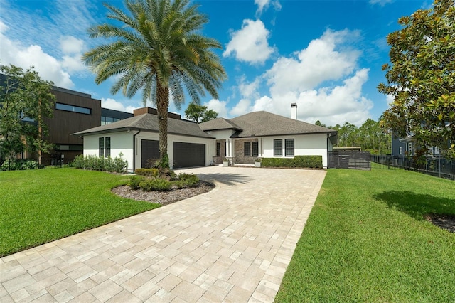 10416 Pocket Ln, Orlando, FL 32836 - view of front of property featuring stucco siding, a garage, and driveway