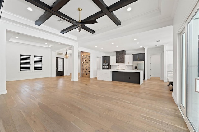 10416 Pocket Ln, Orlando, FL 32836 - unfurnished living room featuring light wood-style flooring, coffered ceiling, beamed ceiling, recessed lighting, and ornamental molding