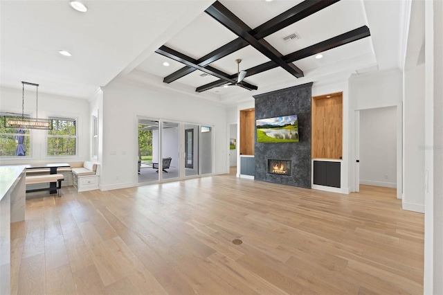 10416 Pocket Ln, Orlando, FL 32836 - unfurnished living room with light wood finished floors, coffered ceiling, beam ceiling, recessed lighting, and a fireplace