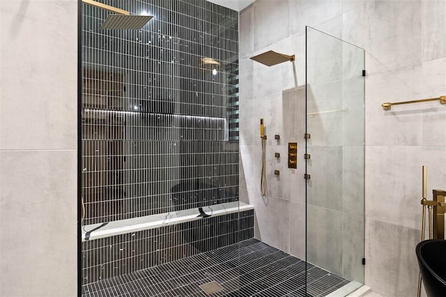 10416 Pocket Ln, Orlando, FL 32836 - full bathroom with a tile shower, tile walls, and tile patterned flooring