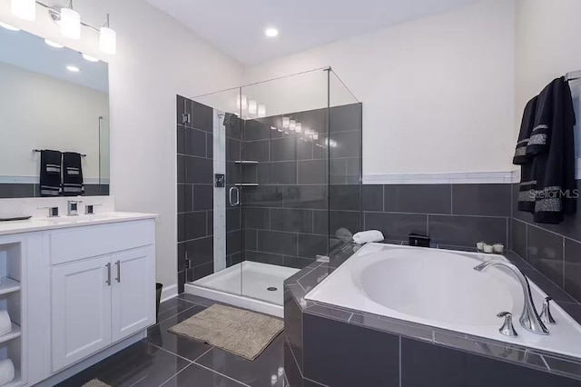 bathroom featuring vanity, separate shower and tub, and tile patterned flooring