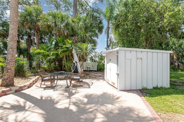 view of patio / terrace with a storage shed