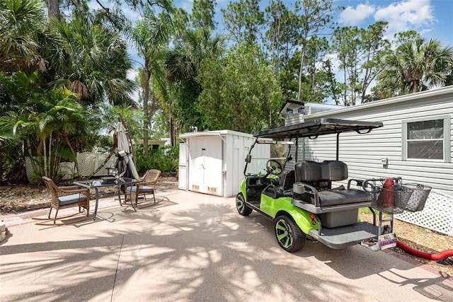 view of patio / terrace with a storage unit