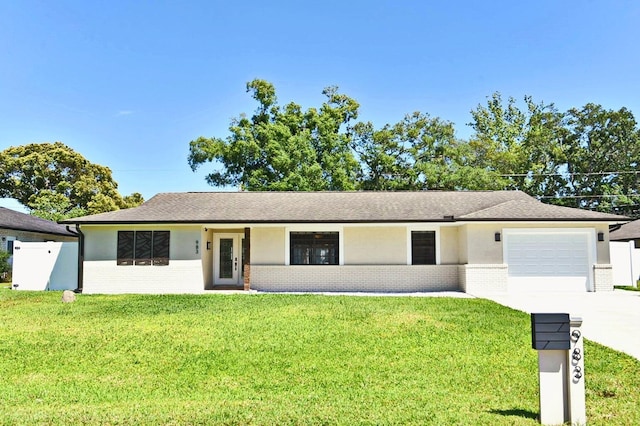 ranch-style home featuring a garage and a front yard