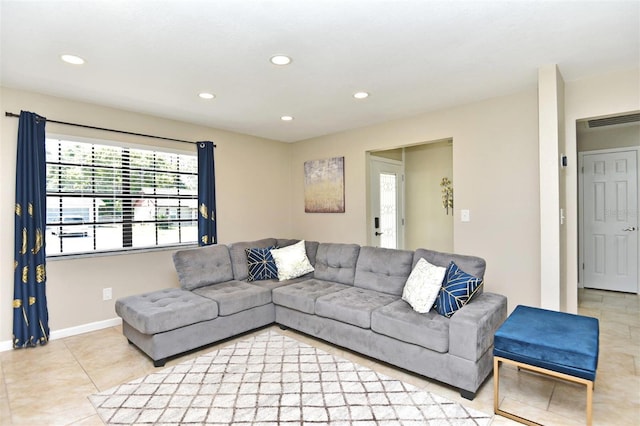 living room with light tile patterned floors